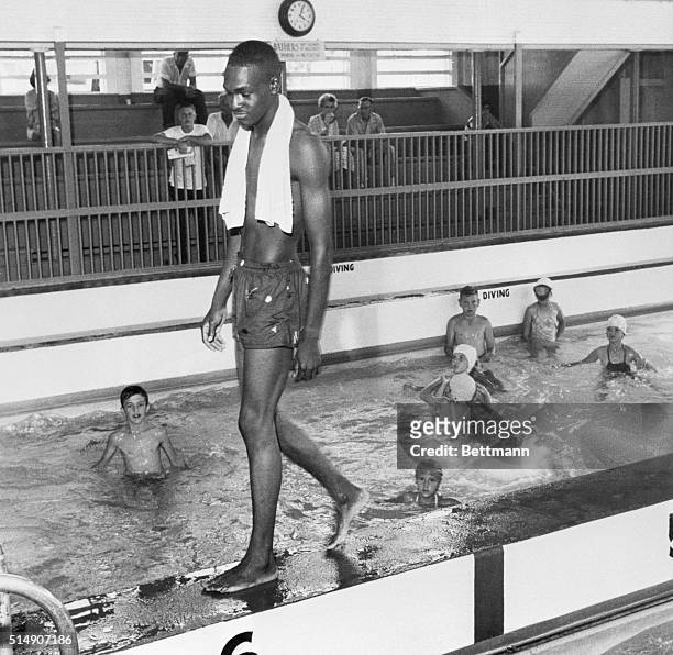 David Isom broke the color line in one of this city's segregated public pools this afternoon which resulted in officials closing the facility. This...