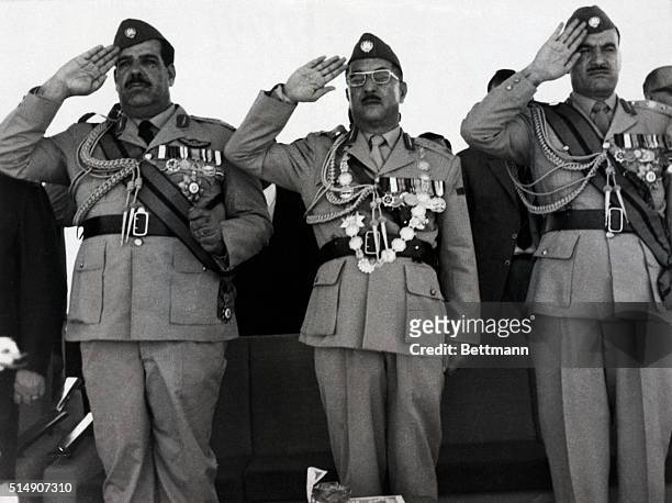 Baghdad, Iraq- Deputy Premier and Defense Minister Lieutenant General Hardan Tikriti, President Ahmed Hassan Al-Bakr, and Chief of Staff Lieutenant...