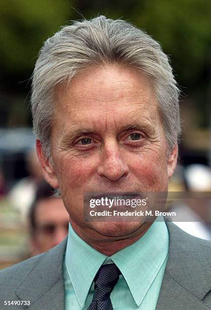 Actor Michael Douglas attends the Palm Springs International Film Society and its Film Festival honoring actor Kirk Douglas on October 17, 2004 at...