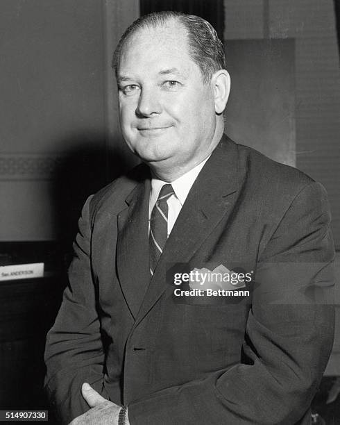 Washington D.C.- Portrait of Dr. Thomas Keith Glennan, standing with his arms crossed.