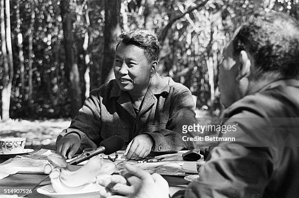 Pol Pot, leader of the Khmer Rouge, in the Cambodian jungle with an ABC news team during an interview. Filed