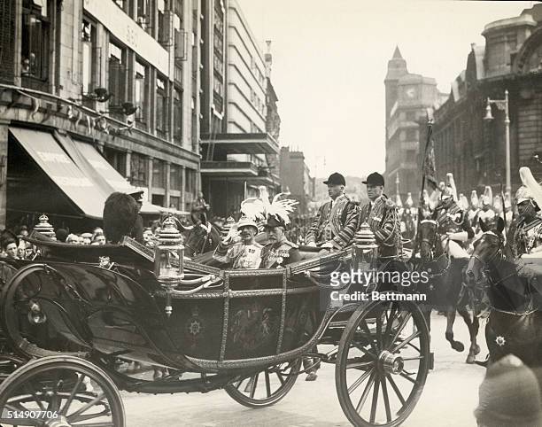 London, England- His Majesty King George VI leaving Victoria Station with King Faisal I of Iraq on their way to Buckingham Palace, where King Faisal...