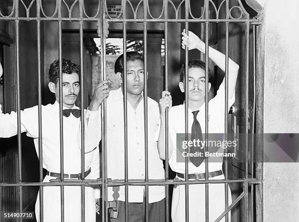 San Juan, Puerto Rico- Pictured behind bars after revolting at the University of Puerto Rico are students : Pelegrina Garcia, Jose Gil De LaMadrid...