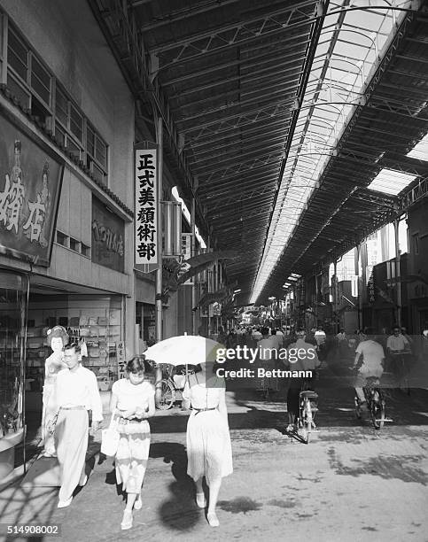 Hiroshima, Japan-Devastated by the first atomic bomb nine years ago, Hiroshima is still in the midst of reconstructing its war-torn buildings....