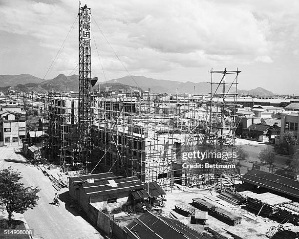 Hiroshima, Japan-Devastated by the first atomic bomb nine years ago, Hiroshima is still in the midst of reconstructing its war-torn buildings. The...