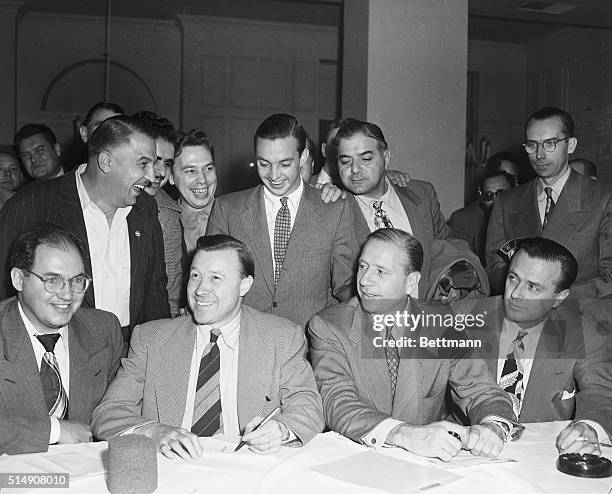 Detroit, MI-Winding up 119 days of negotiation with a 34-hour continuous session, the Ford Motor Company and the United Auto Workers, CIO, agree to a...