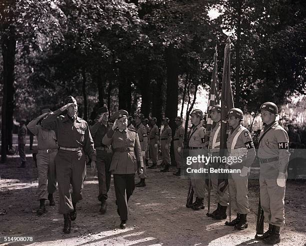 Italy-Lieutenant General Mark W. Clark, commander of the Allied Fifth Army, escorts Major General Eurico Gaspar Dutra , Brazilian Minister of War, on...