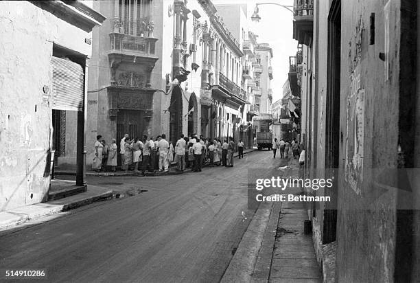 Havana, Cuba-Cubans line up for bread in front of a bakery in Old Havana, although bread is one of the few staple foods not rationed. The shoppers...