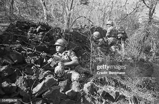 El Playon, El Salvador-A British ITV crew films members of El Salvador's U.S.-trained Atlacatl Battalion recently. The battalion, made up of...