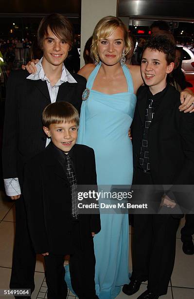 Actors Nick Roud, Luke Spill, Kate Winslet and Joe Prospero arrive at the UK Charity Premiere of "Finding Neverland" at the Odeon Leicester Square on...