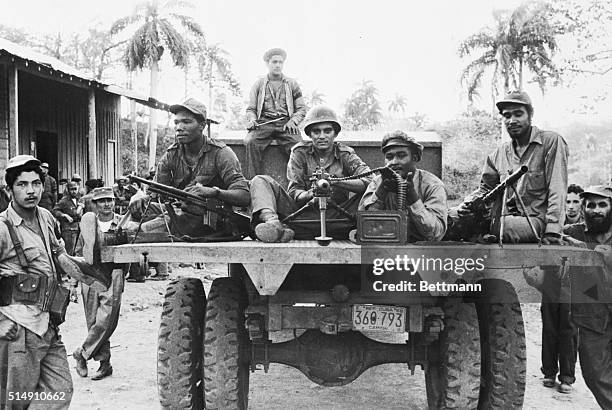 Sierra Maestra, Criente, Cuba-Members of Fidel Castro's rebel column meet at an assembly point in the Sierras a few hours before a hit-and-run attack...