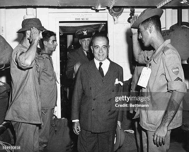 President Getulio Vargas enters the troops quarters on an inspection tour through a Coast Guard-manned troop transport which carried Brazillian...