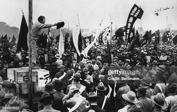 Tokyo, Japan-A scene at a meeting in Tokyo on May Day, which preceeded the longest labor parade ever held in Japan. An orator is shown haranguing his...