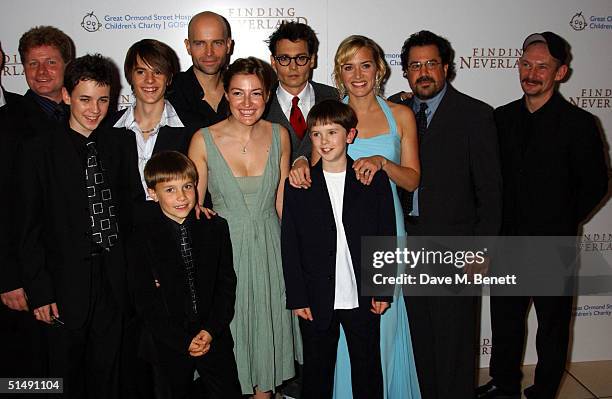 Cast Joe Prospero, Nick Roud, Luke Spill, Marc Foster, Kelly Macdonald, Johnny Depp, Freddie Highmore, Kate Winslet and Ian Hart arrive at the UK...