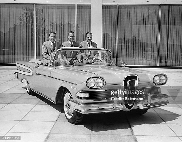Dearborn, MI - The three sons of the late Edsel Ford show off a Citation Convertible Edsel at the national press introduction of the new car. They...