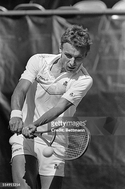 New York, NY- Sweden's Mats Wilander hits a two-handed backhand during his match with American Bill Scanlon.