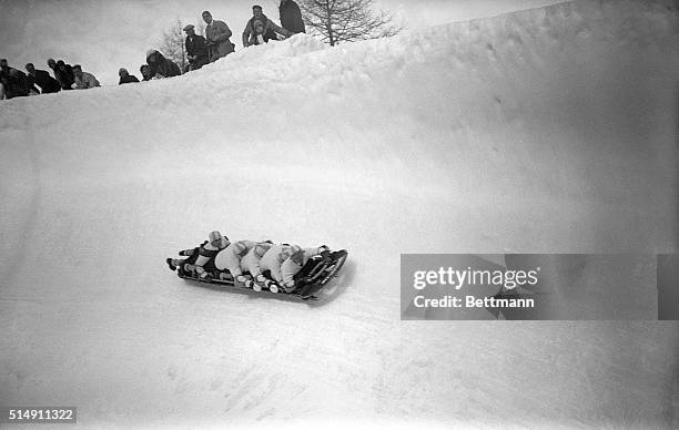 Moritz, Switzerland:- View during the bob sled race in the winter olympic games at St. Moritz. Photo shows the German team rounding the turn.