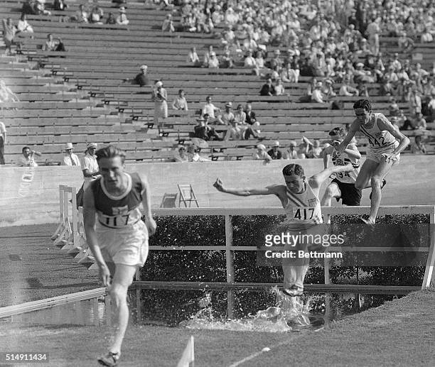 Los Angeles, CA- Photo shows the start of the 3000-meter steeplechase, Volmari Iso-Hollo of Finland; #417, G.W. Dawson of U.S.A.; #194, T. Evenson,...