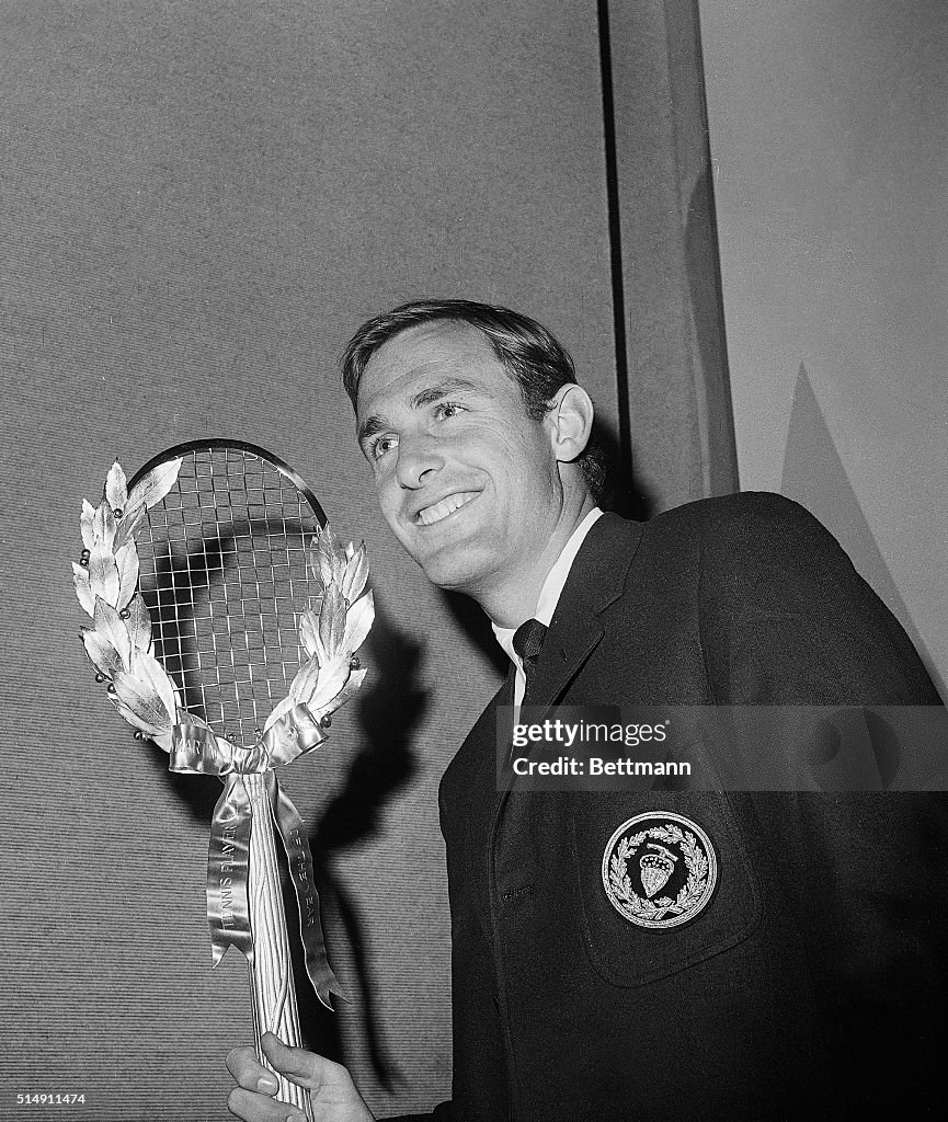 John Newcombe with Tennis Trophy