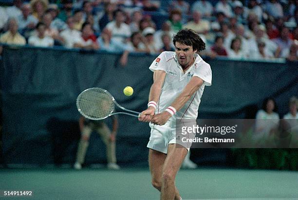 Flushing Meadows, NY- Picture shows tennis pro Jimmy Connors returing the ball to Ivan Lendl during a match at the US Open.
