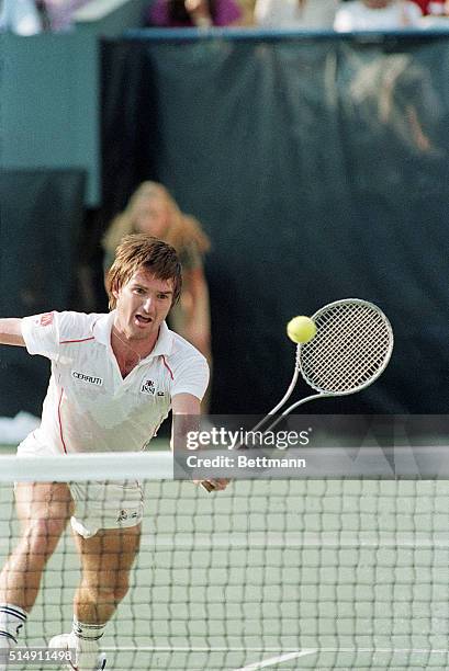 Flushing Meadows, NY: Picture shows tennis pro Jimmy Connors returing a backhand to Ivan Lendl during their match in the US Open.