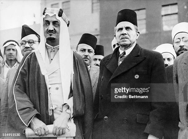 Lydda, Palesteine- His Royal Highness, Emir Faisal, son of the King of Saudi Arabia, and his Foreign Minister, arrived by air in Palestine on his way...