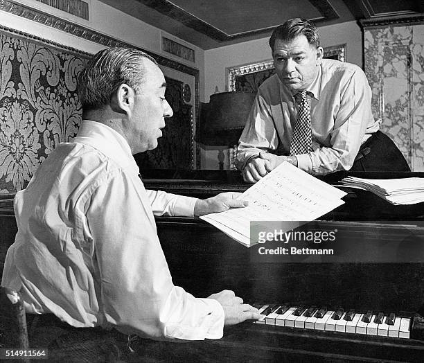 Music composer Richard Rodgers and lyricist Oscar Hammerstein, II finish work on their latest production, Me and Juliet.