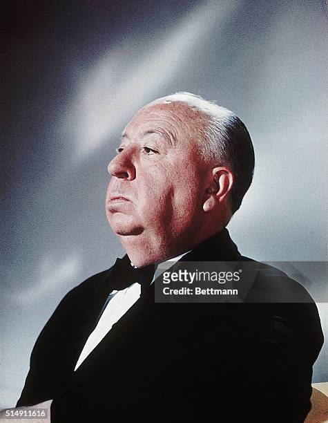 Hollywood, California- Alfred Hitchcock, motion picture and television producer/director. He is seated in profile.