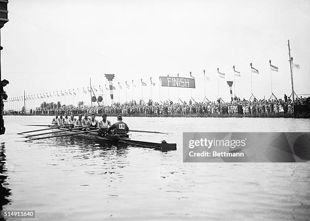 Amsterdam, Holland- This photo shows the American crew, winners of the 8-oar crew race with Great Britain, after they had received the Laurel Wreath,...