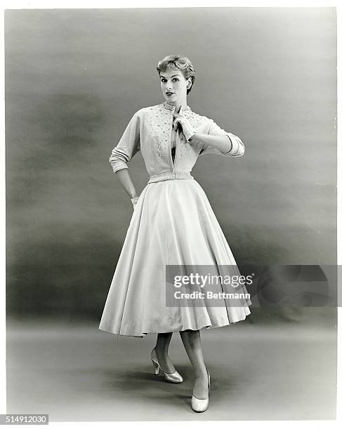 Bender & Hamburger's "Costume Intime" - a revolutionary, new ensemble for the woman who seeks something a little "different". Sumptuous blond velvet...