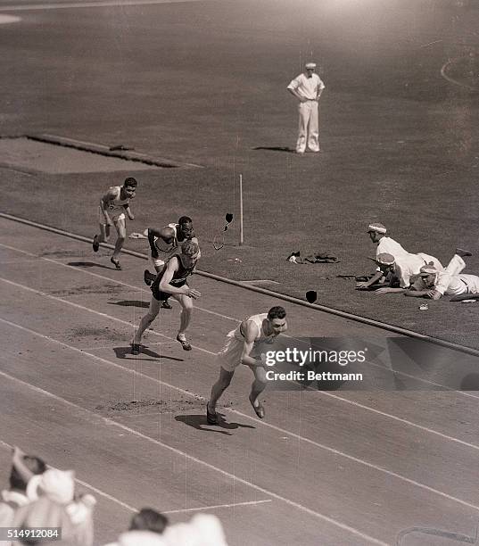 Los Angeles, CA- SUMMER OLYMPICS. 200-meter men's race. First trials. Second heat. Lane-E. Sanchz-Mexico. Second lane: E. Jolan , second place; third...