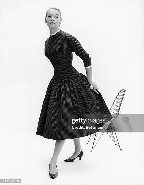 - Lanz elongated silouette... Interpreted in one hundred percent worsted wool. A white linen collar ends in back bow, is ric-rac edged as are the 3/4...