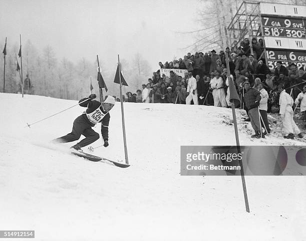 Cortina, Italy- Austrian skier Tony Sailer drives hard in the men's special slalom, on his way to victory in the two-run Olympic event at Cortina....