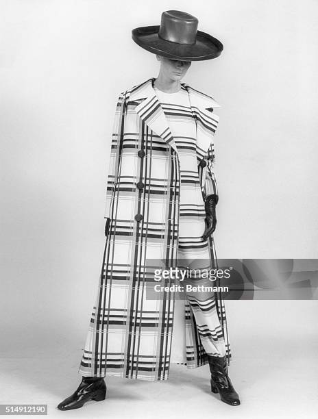 Rome, Italy- Italian designer Federico Forquet calls it his "Maxi-Poncho" coat and trouser suit and it fills in on the "long" story of the fashion...