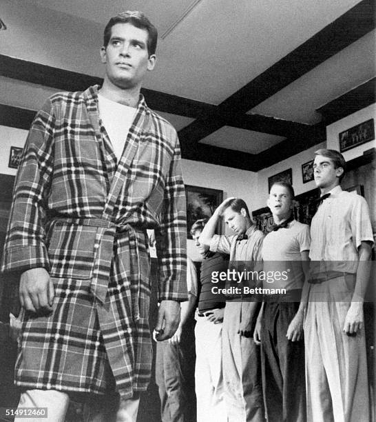 Remind you of anyone? Well, Scott Newman, wearing a bathrobe in this scene from the Paramount Pictures release, "Fraternity Row," is actor Paul...