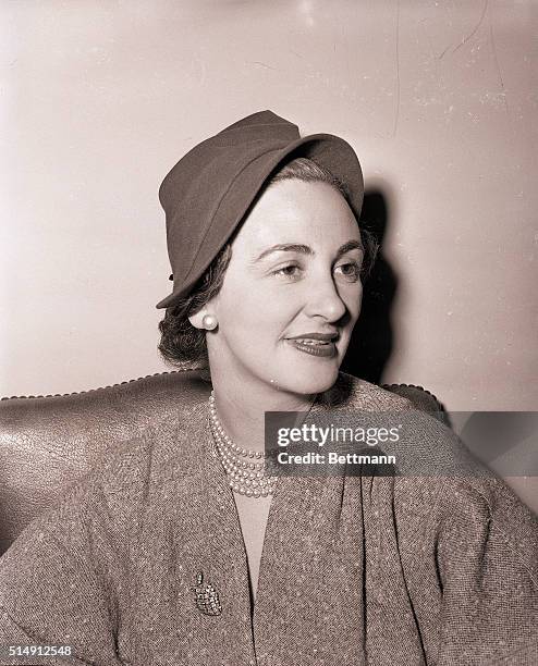 New York, NY- Irish fashion designer Sybil Connolly models one of her creations from Dublin, a green felt leprechaun hat. She arrived in the U.S. On...