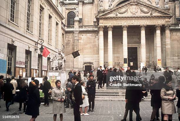 Paris, France- Striking students mingle on the grounds of Sorbonne University. In the background is a statue of scientist Louis Pasteur. France's...