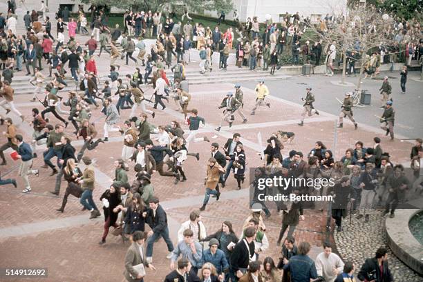 Paris, France- Striking students mingle on the grounds of Sorbonne University where they hung a portait of Mao Tse-Tung, a North Vietnamese flag ,...