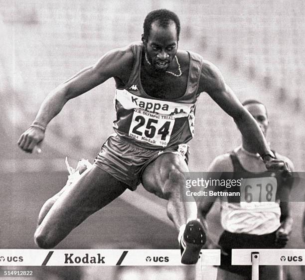 Los Angeles, CA- Edwin Moses gets across the last hurdle to win the men's 400-meter hurdles in 47.79 seconds, during Olympic Track and Field Trials....