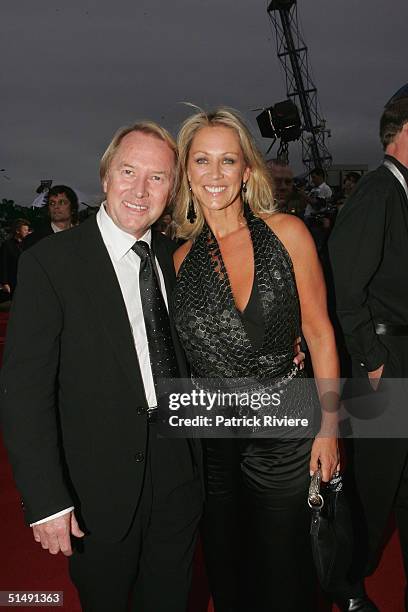 Music promotor Glenn Wheatley and his wife arrive for the 2004 ARIA Awards at the Superdome October 17, 2004 in Sydney, Australia.