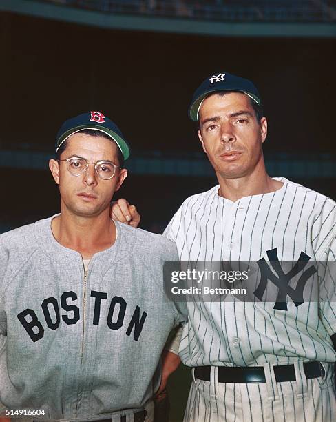 Closeup of Dom DiMaggio, Boston Red Sox, and brother Joe, NY Yankees, in their team's uniform.