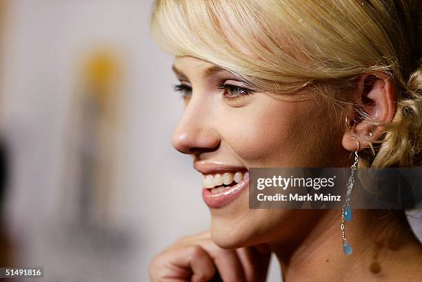 Actress Scarlett Johansson attends the Hollywood Film Festival's closing night premiere of "A Love Song For Bobby Long" at the ArcLight Theatre...