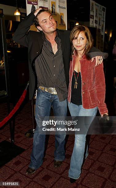 Actor Clayne Crawford and guest attend the Hollywood Film Festival's closing night premiere of "A Love Song For Bobby Long" at the ArcLight Theatre...