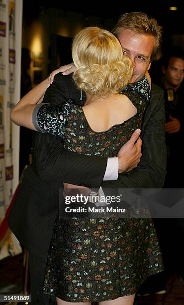 Actors Scarlett Johansson and Gabriel Macht attend the Hollywood Film Festival's closing night premiere of "A Love Song For Bobby Long" at the...