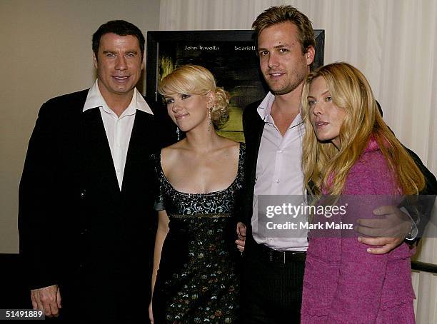 Actors John Travolta, Scarlett Johansson, Gabriel Macht and Deborah Unger attend the Hollywood Film Festival's closing night premiere of "A Love Song...