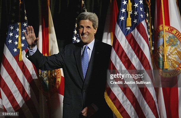 Democratic presidential candidate U.S. Senator John Kerry waves to supporters before speaking at the Tampa Bay Performing Arts Center October 18,...