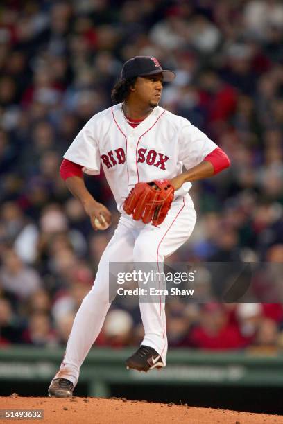 Pitcher Pedro Martinez of the Boston Red Sox throws a pitch against the New York Yankees in the second inning during game five of the American League...