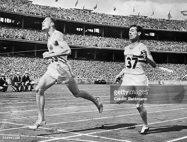 Melbourne, Australia: XVITH OLYMPIAD. COURTNEY OF U.S. WINS 800 METERS. Tom Courtney, of the United States , is shown winning the final of the 800...