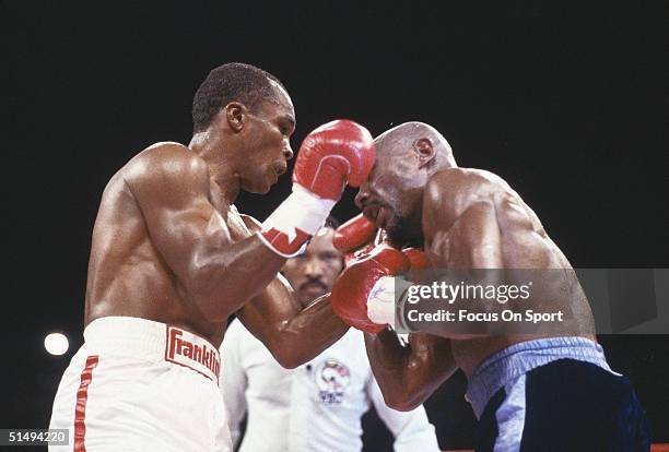 Marvin Hagler dodges a blow from Sugar Ray Leanard during a bout at Caesars Palace in Las Vegas, NV on April 6, 1987.