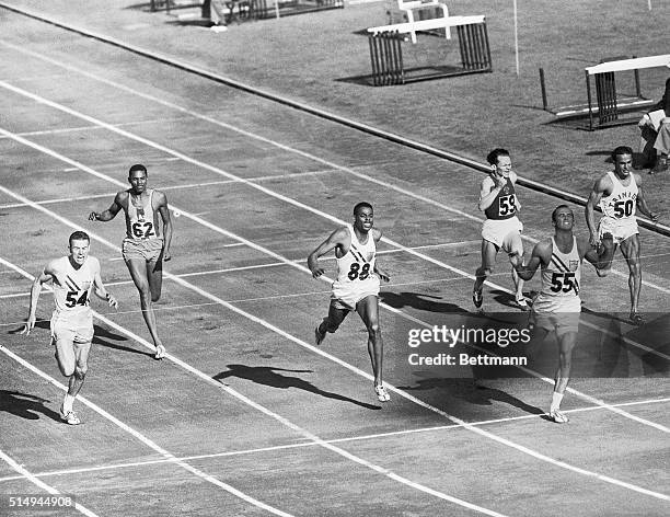 Melbourne, Australia- MORROW RACKS UP SECOND GOLD MEDAL. The U.S. 200 meter team of Bobby Morrow , Andy Stanfield and Thane Baker finish in that...